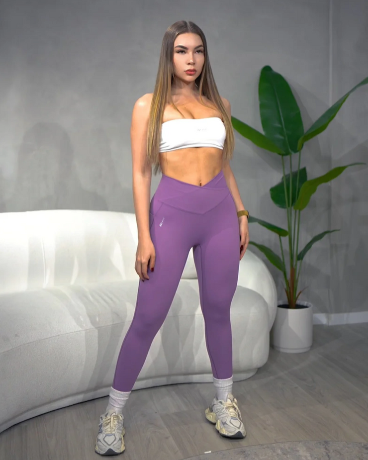 Leggings cruzado lila con bolsas laterales